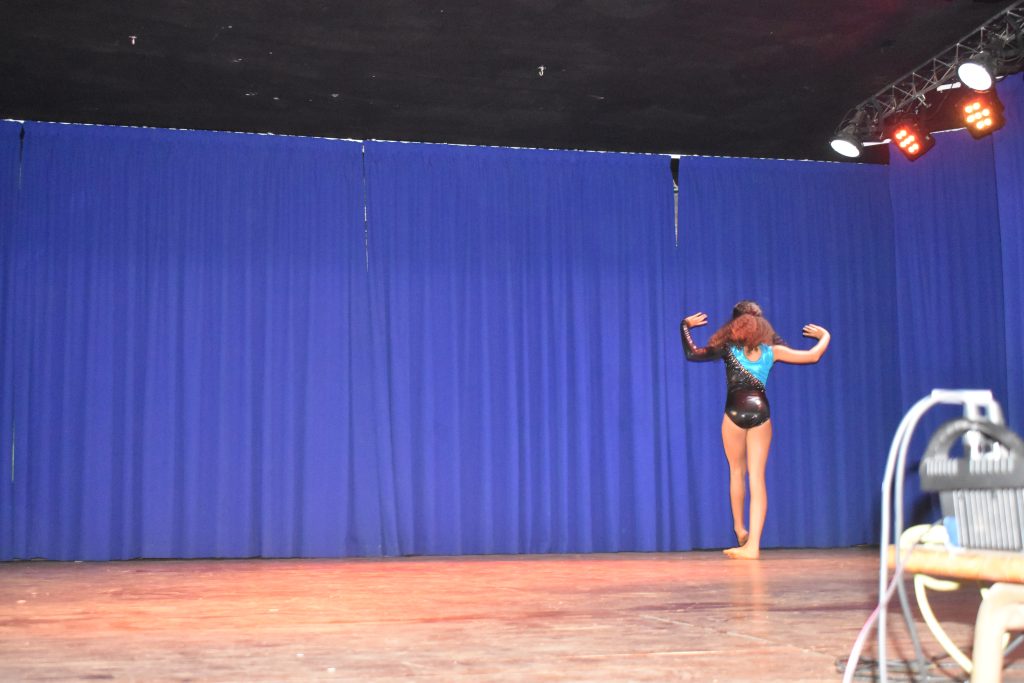 A performer on the wide Showcase stage