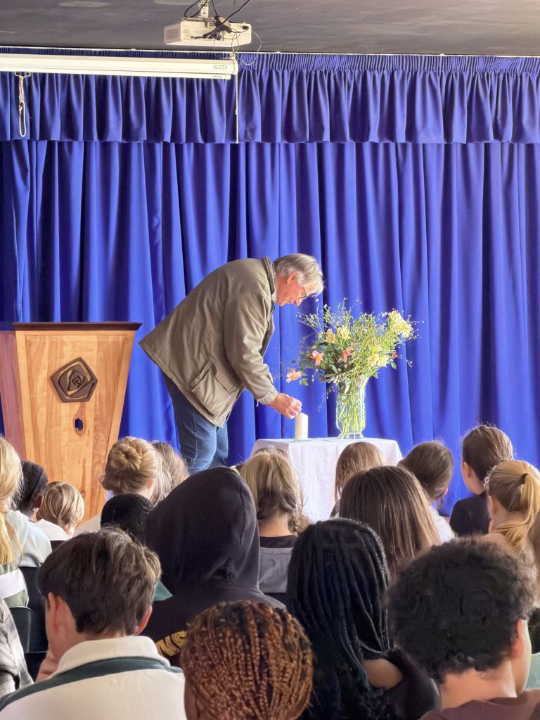 Flowers on stage at the Founders Day assembly