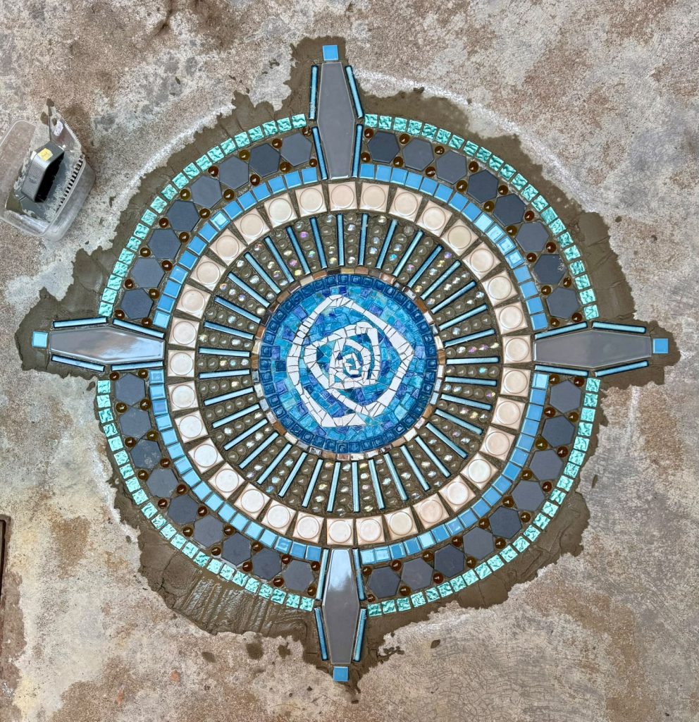 The compass mosaic with the rose at its centre